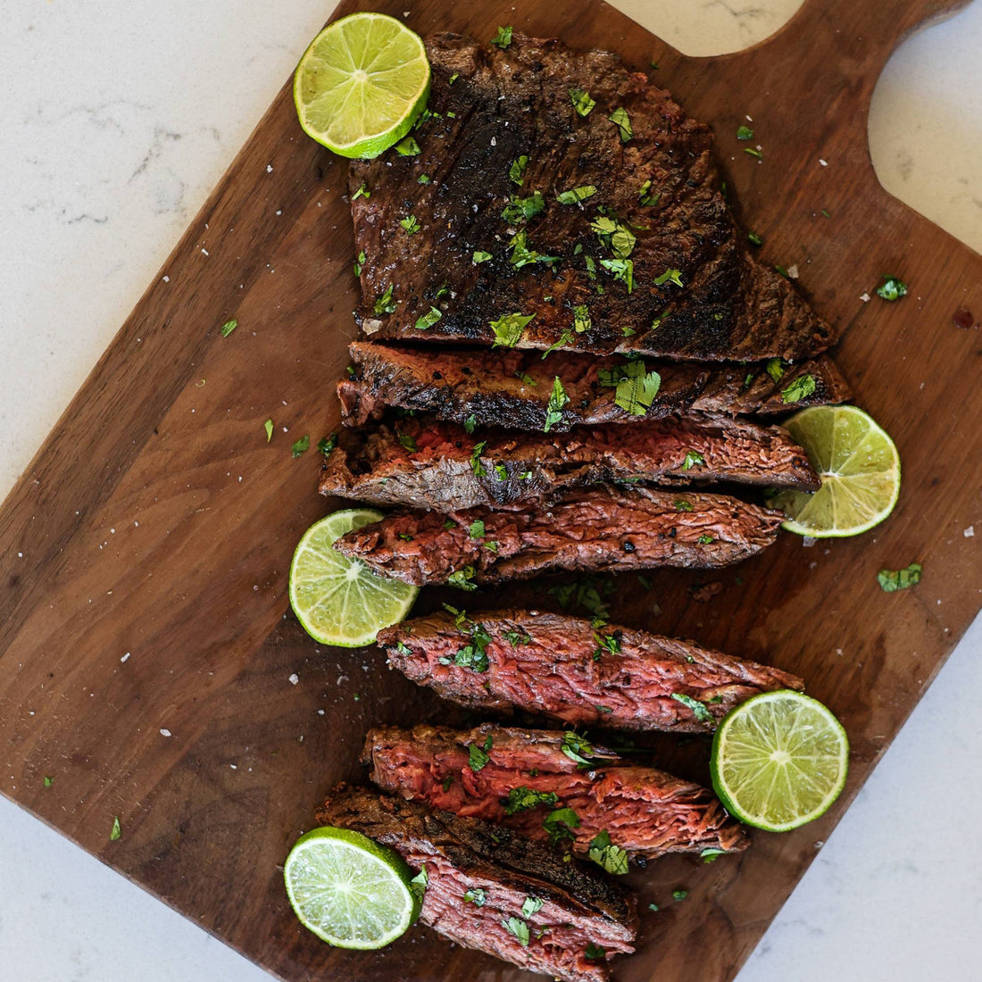 Cooked skirt steak, sliced across the grain